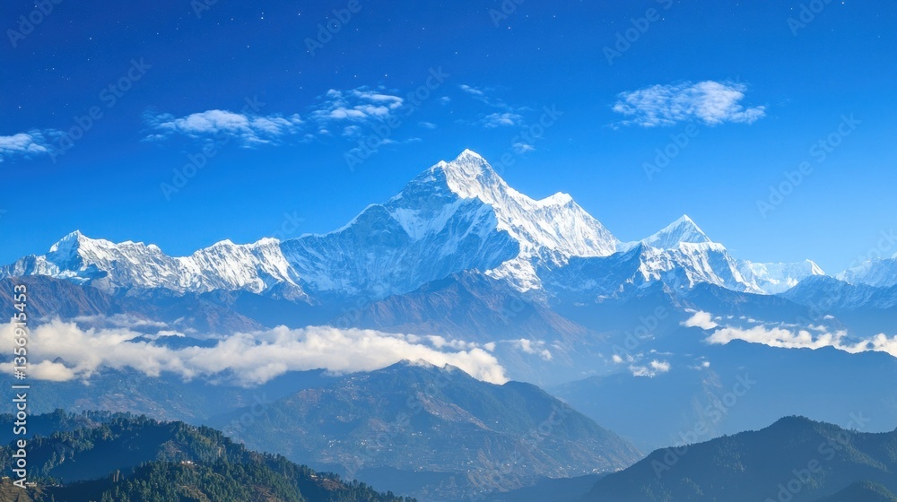 Fototapeta premium Majestic Snowy Peaks, A Breathtaking Mountain Range Under Azure Skies