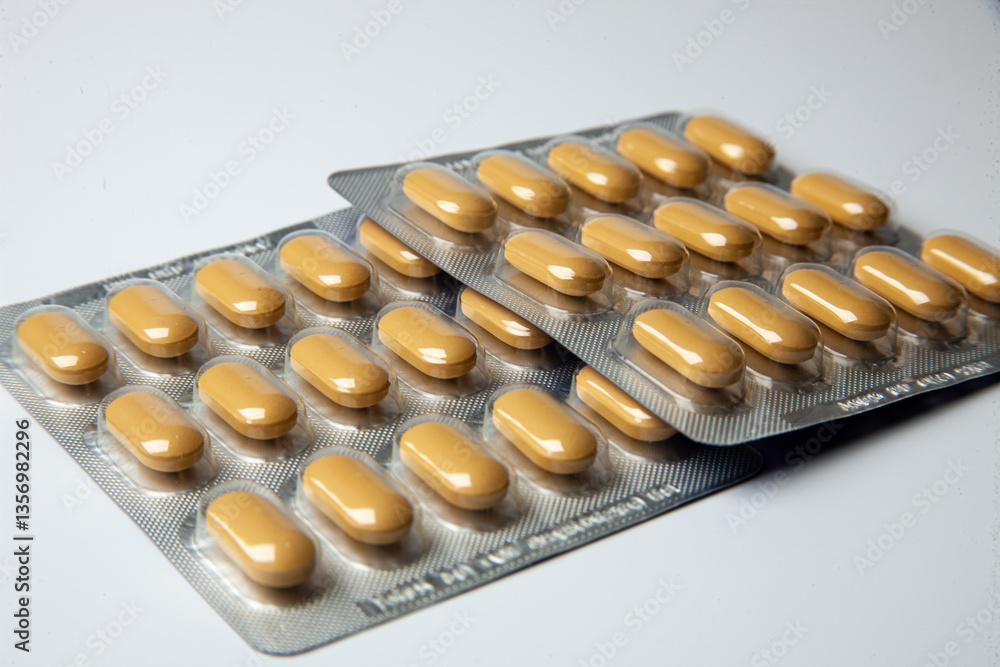 Tablets in packages on a white background Tablets in packages on a white background