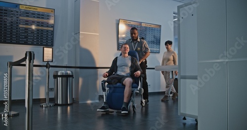 Wallpaper Mural Security Checkpoint in Airport Terminal: Man with Prosthetic Leg Getting Up from Wheelchair, Passing X-ray Metal Detector Scanner, Security Staff Helping Man. Passengers During Screening Procedures. Torontodigital.ca