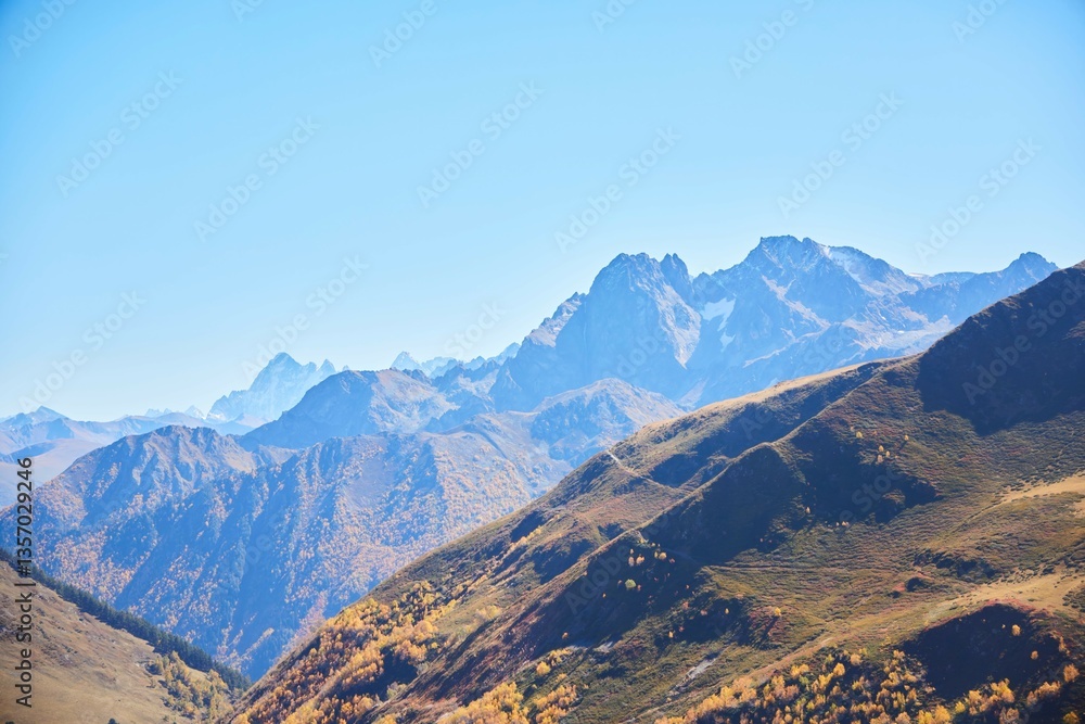 Fototapeta premium Mountain landscape. Autumn colors of the forest. The Caucasus Mountains