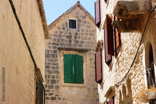 Obraz na płótnie Picturesque Mediterranean street and traditional architectural details in Trogir, Croatia. w salonie