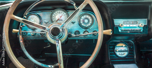 Retro styled image of an American classic car interior with radio