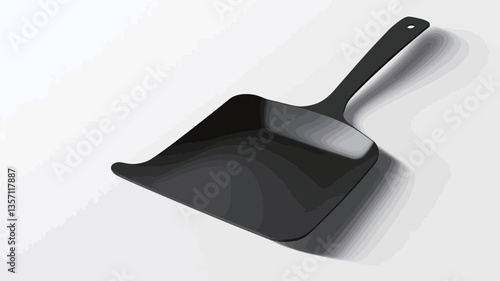 High-angle, close-up view of a black dustpan lying on a plain white background. The dustpan is sleek and minimalist in design, with a slightly curved collecting area and a simple, straight handle.