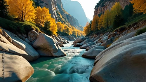 Tranquil teal river flows through a vibrant autumn canyon, surrounded by colorful foliage and smooth rocks.