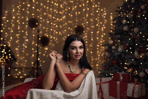 Wallpaper Mural Young woman in evening dress against christmas tree. Torontodigital.ca