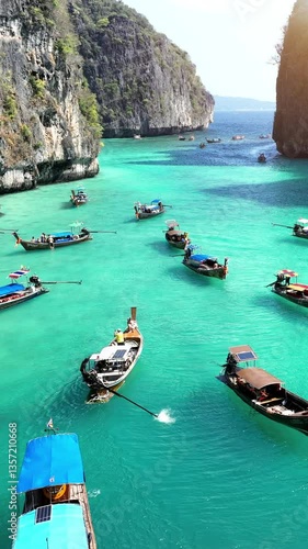 Tourist relaxing on Longtail boats at Koh Phi Phi Don island in Ao Nang, Krabi, Thailand.