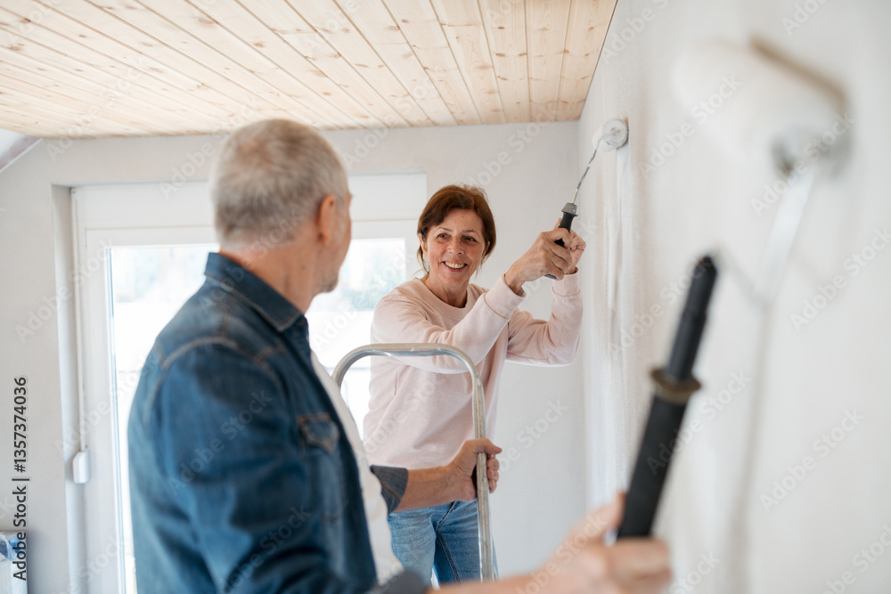 Obraz premium Senior couple renovating their home, a shared retirement activity.