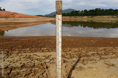 Low level of water is measured by a gauge in a reservoir dam during a severe drought in Sao Paulo, Brazil.