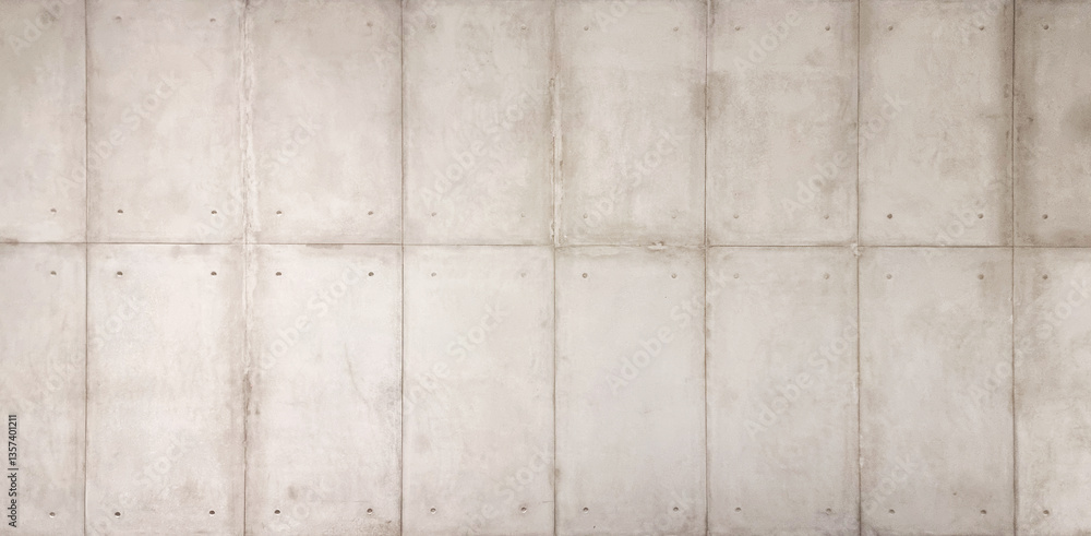 texture showcasing a gray concrete wall with a distinct panel pattern, reflecting the uchippanashi style of unfinished concrete, often found in modern Japanese architecture. concrete wall background. texture showcasing a gray concrete wall with a distinct panel pattern, reflecting the uchippanashi style of unfinished concrete, often found in modern Japanese architecture. concrete wall background.