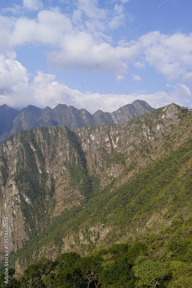 Stunning views over the old historic ruins of Machu Picchu in the Andes Mountains cloud forests of Peru Stunning views over the old historic ruins of Machu Picchu in the Andes Mountains cloud forests of Peru