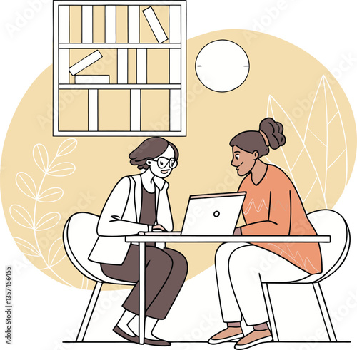 Two Women Working Together on a Laptop