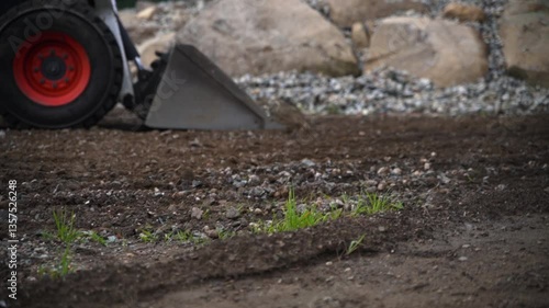 Wallpaper Mural Mini excavator leveling the dirt Torontodigital.ca