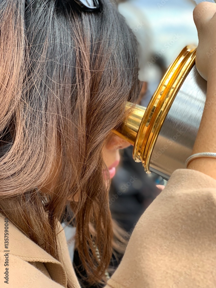 Fototapeta premium Woman Looking Through Telescope