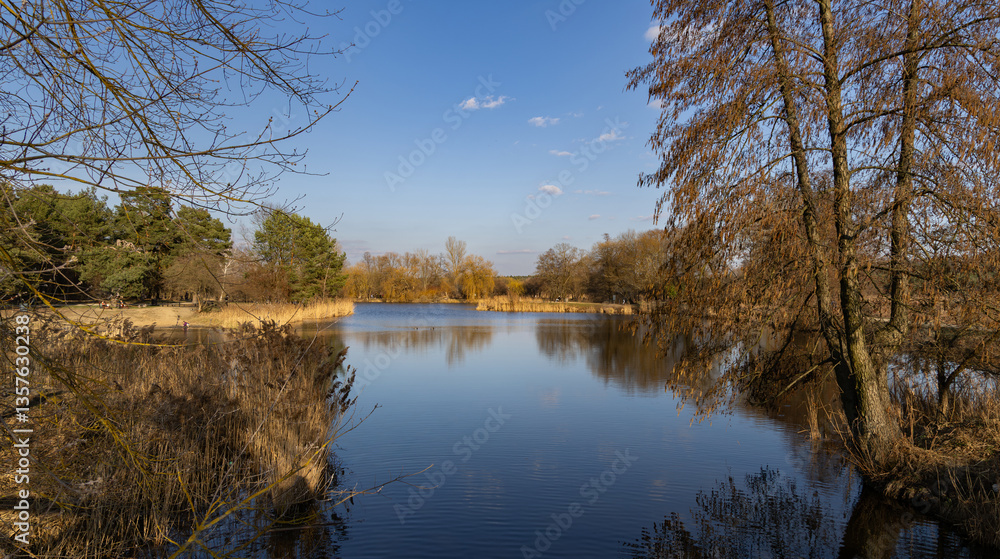Obraz premium Piaseczno Ponds shortly before sunset, between winter and spring, Masovia, central Poland