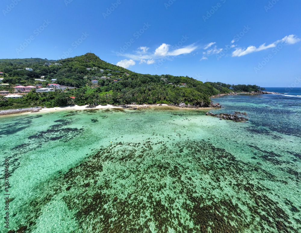 Aerial view of turquoise water in a tropical beach
