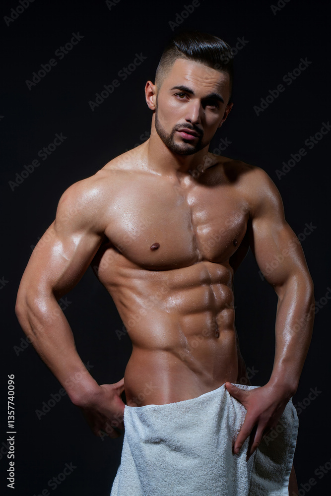 Fototapeta premium Sexy male model with muscular nude body. Shirtless sexy muscled male model. Muscular handsome model with strong body. Sexy sport muscle model. Sexy man with naked torso, fit naked man.