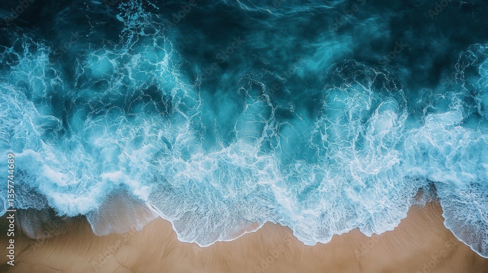 Aerial view of ocean waves crashing on sandy beach Aerial view of ocean waves crashing on sandy beach