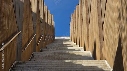 Obraz na płótnie Concrete staircase with wooden walls w salonie