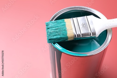 Obraz na płótnie Can of teal paint and brush on color background, closeup. Space for text w salonie