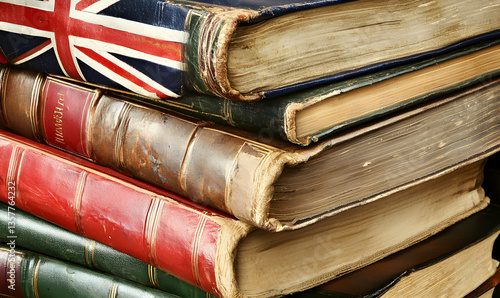 Stack of Antique Books with Colorful Covers and Worn Pages