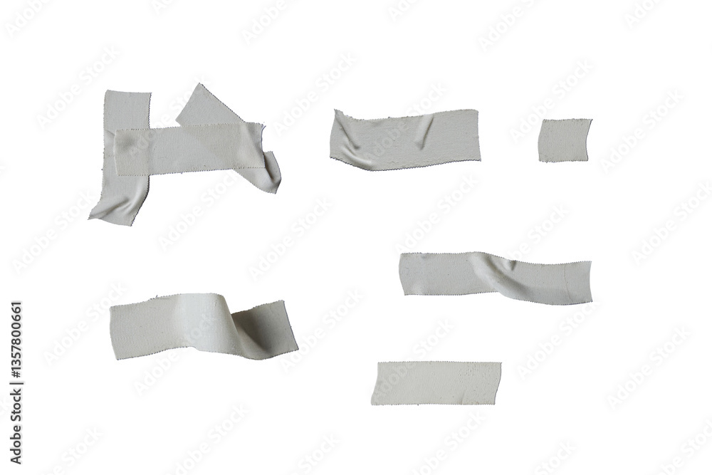 Various pieces of adhesive fabric tape on a white background for crafting and repair purposes