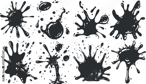 Set of black ink splatters and splashes on a white background.
