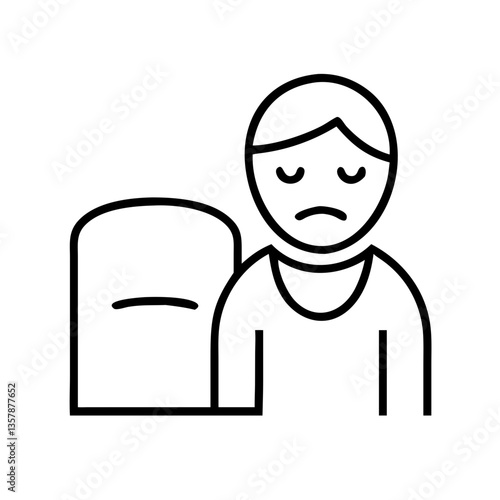 Sad person sitting next to a gravestone