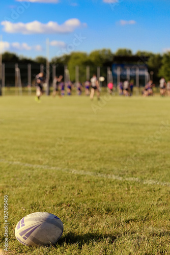 Rugby football game, and blurred players in the background