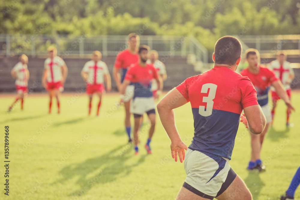 Rugby game with out of focus players in the background