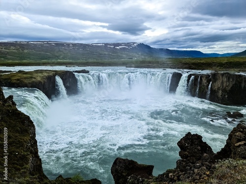 Godafoss waterfall cascading into a powerful stream in Iceland