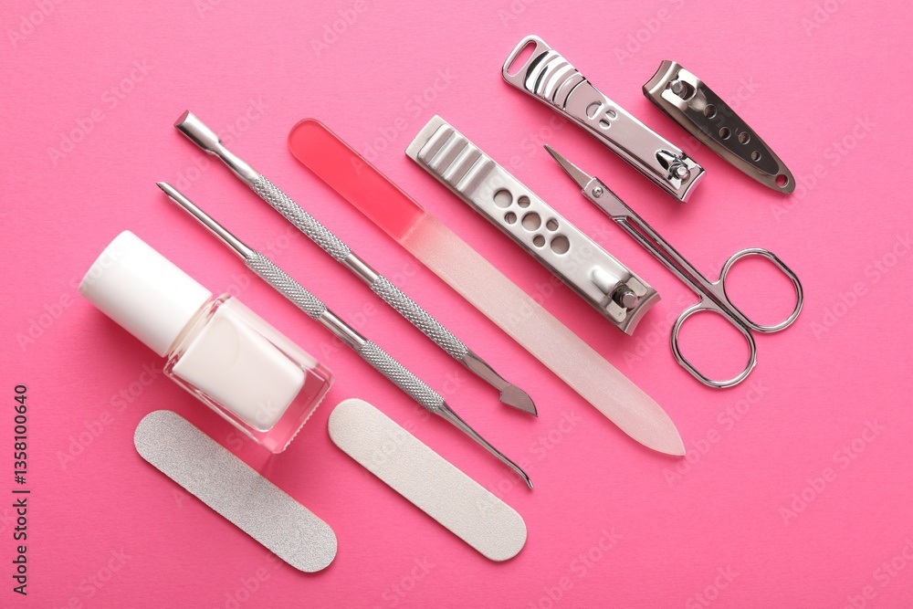 Set of different manicure tools on bright pink background, flat lay Set of different manicure tools on bright pink background, flat lay