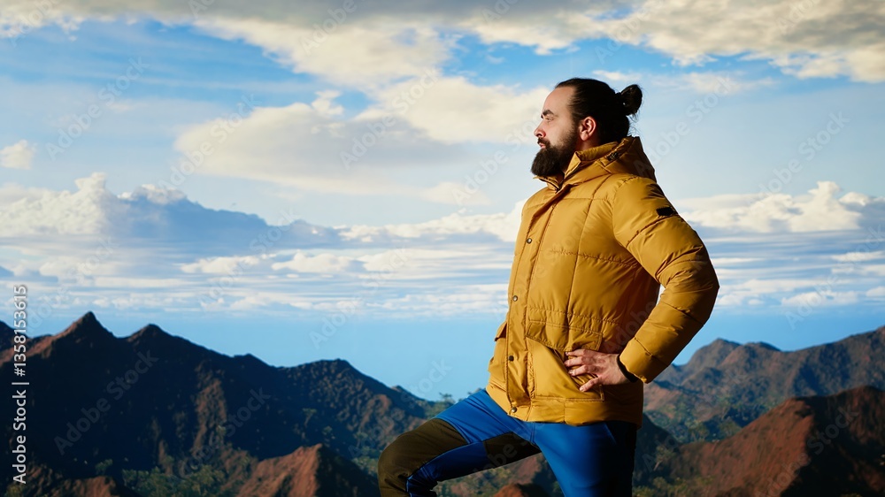 Naklejka premium Hiker pauses to admire the panoramic mountain scenery on the hill top, endless sky and rugged peaks creating a breathtaking backdrop for mental clarity. Adventure seeker. Camera B.