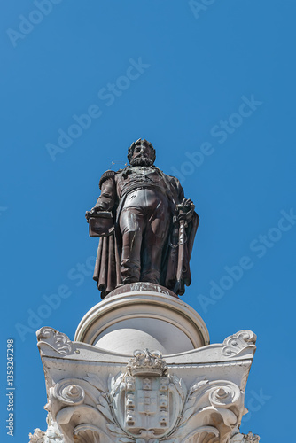 Obraz na płótnie Column of Pedro IV (Coluna de Don Pedro IV) -King Peter IV of Portugal and Algarves monument in Rossio Square (1870). Pedro IV Statue sits atop a 23-metre column. Lisbon, Portugal. w salonie