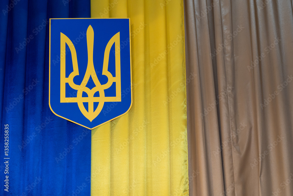 Fotografie Ukrainian trident emblem displayed against blue and yellow backdrop