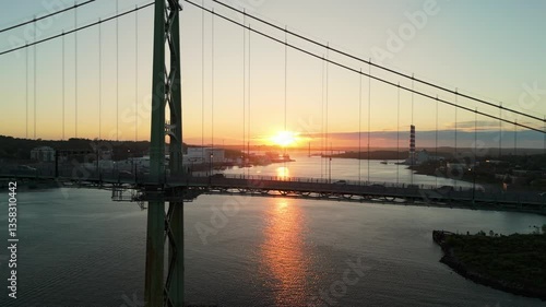 Stunning Aerial Footage Historic Highway Bridge Connecting Halifax And Dartmouth. The Steady Traffic Flowing Across The Bridge Represents The Lifeline Between These Two Key Cities In Nova Scotia.