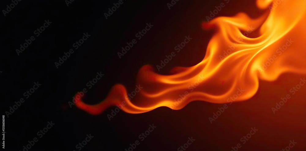 Fototapeta premium Intense fire flames dancing against a dark black background, power, danger