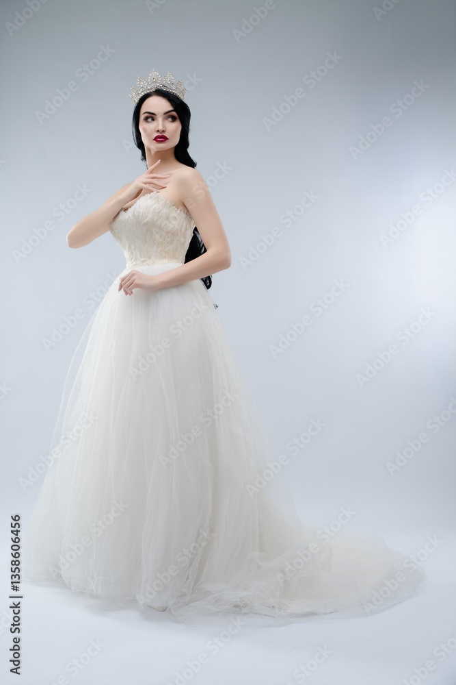 Elegant bride in stunning lingerie-inspired gown with beautiful crown Elegant bride in stunning lingerie-inspired gown with beautiful crown