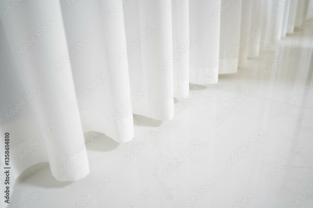 White curtains and marble tiles floor