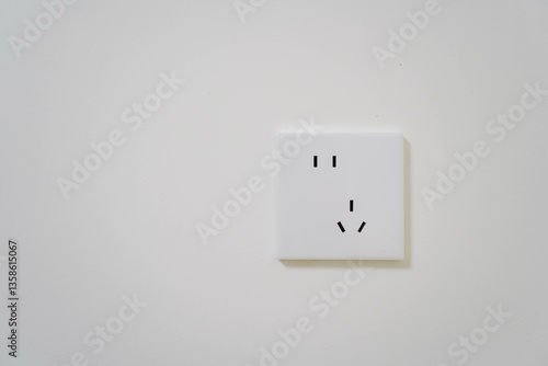 Obraz na płótnie White Electrical Outlet and Wall Plate at the white wall, symbolizing energy connection and electrical power source w salonie