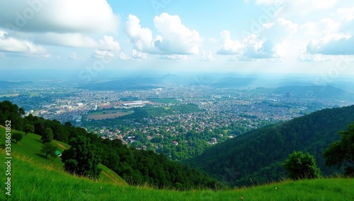 Panoramic view of Kigali city and its outskirts captured from a hilltop viewpoint with lush green landscape and scattered buildings, Kigali,  houses