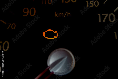 engine malfunction light on the dashboard of a car