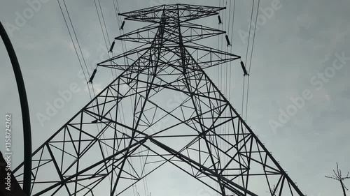 Power Transmission Tower Against Dramatic Overcast Sky