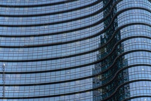 Modern glass facade in Milan.