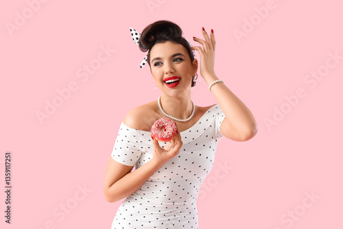 Young pin-up woman with tas...