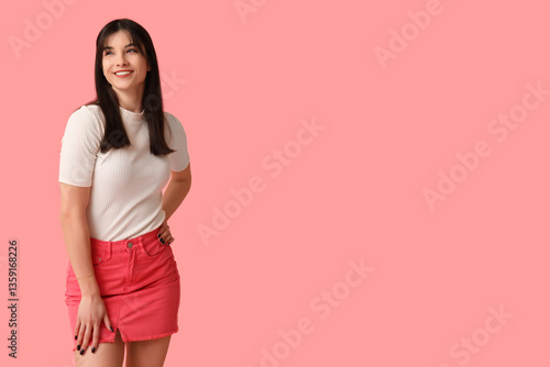 Young Asian woman in pink t...
