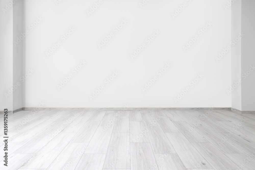 View of empty room with laminate floor and light wall View of empty room with laminate floor and light wall