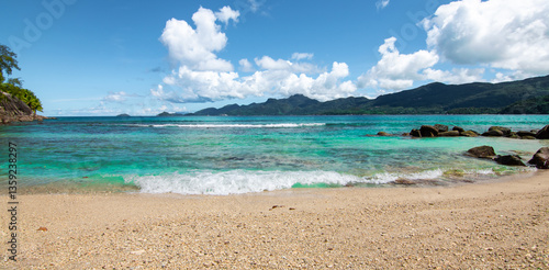 Obraz na płótnie Panoramic View of Tropical Beach with Blue Sky and Clouds. Mahé Island, Seychelles w salonie