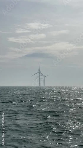 A wind turbine farm in the North Sea off the coast of England.