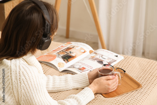 Beautiful young woman in he...