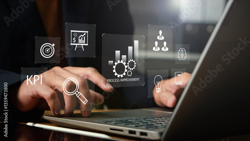Obraz na plátně Process improvement concept, Continuous improvement,  Improve the efficiency and effectiveness of company and industry operations Businessman solving problems improving organizational processes